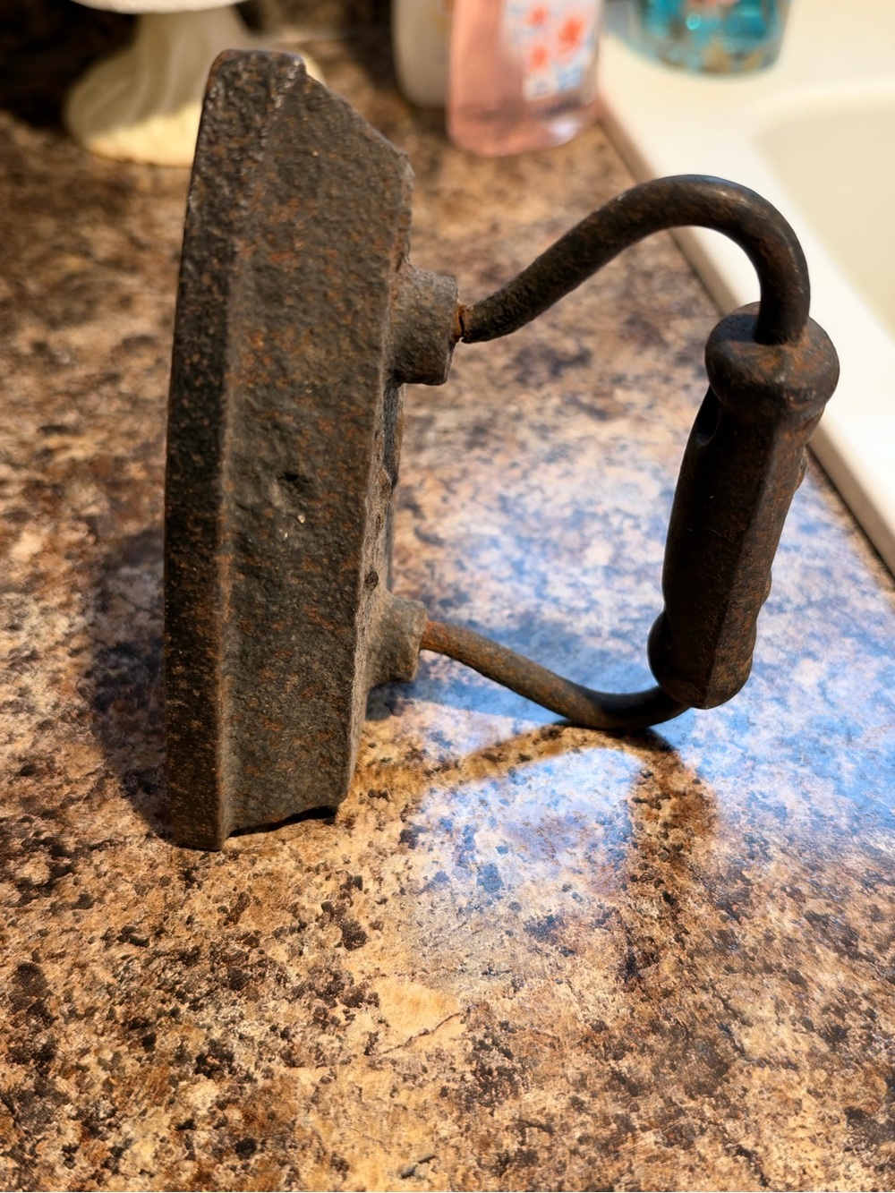 Old small cast iron clothes iron